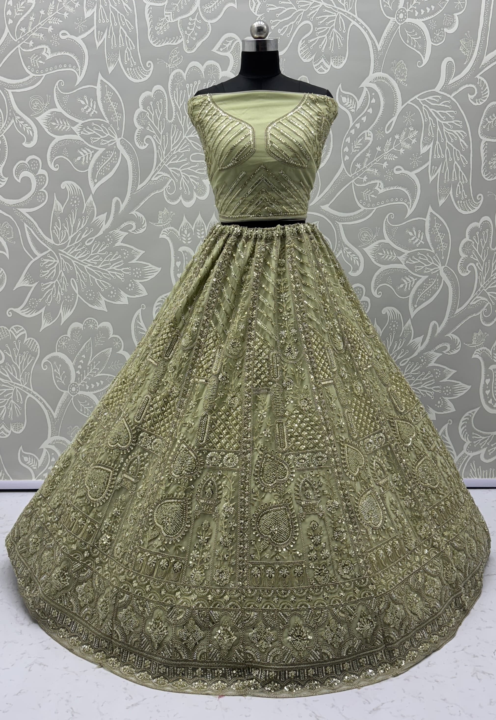 Sober Handwork Pastel Green Motif and Crystal Pipe work Designed Reception Wear Collection in Lehenga Choli